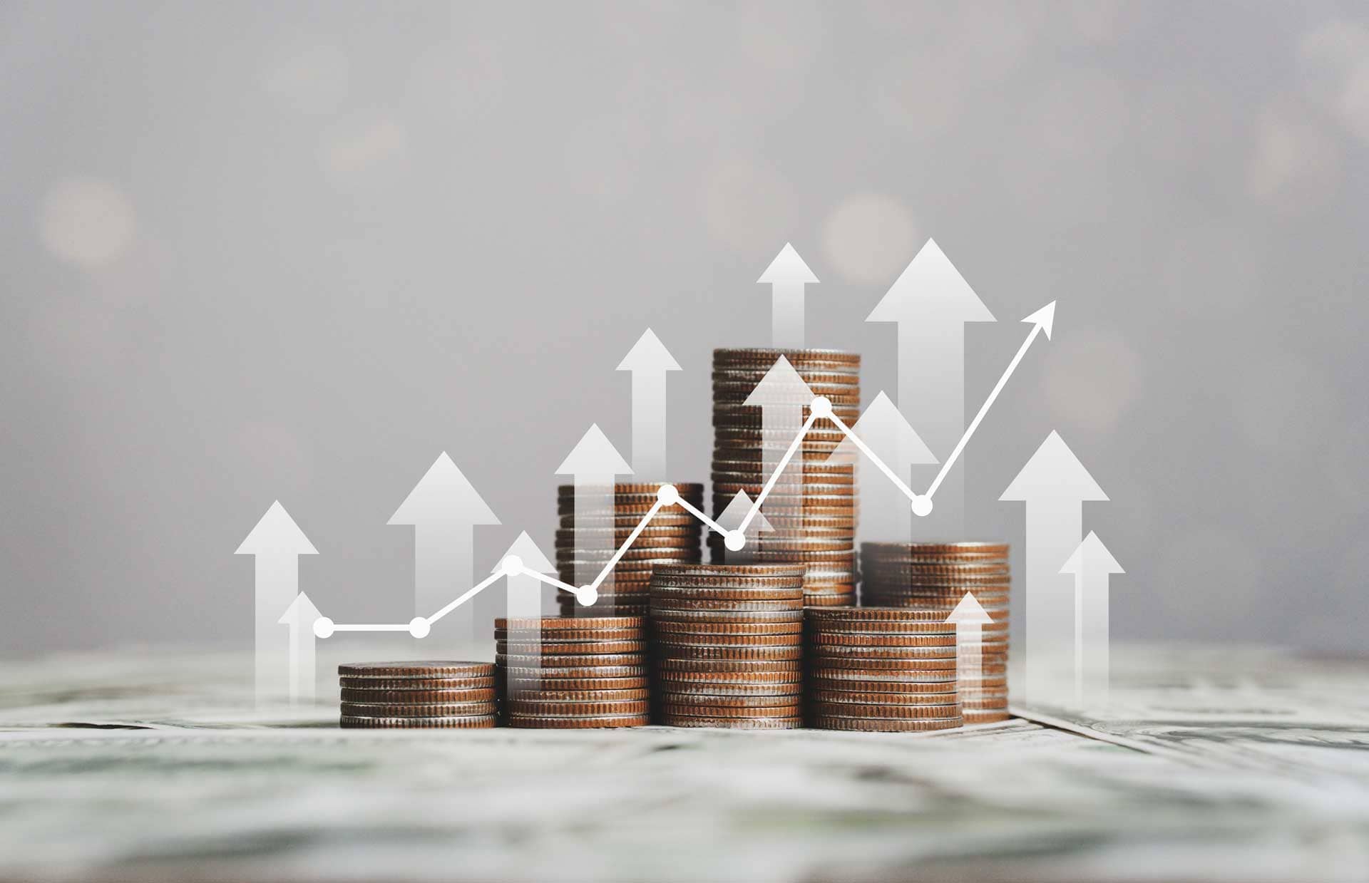 Stacked coins emulating an upward stock trend